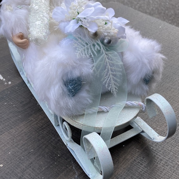 Snowy Porcelain Baby on a Sleigh - Picture 4 of 6